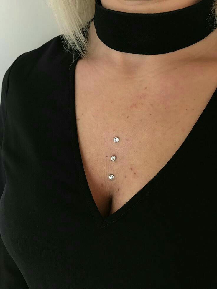 Sternum micro dermal piercing